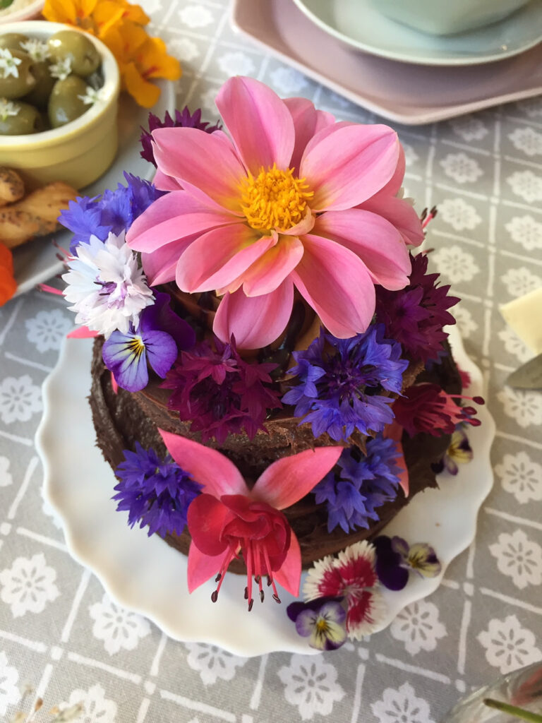 Chocolate cake with edible flowers